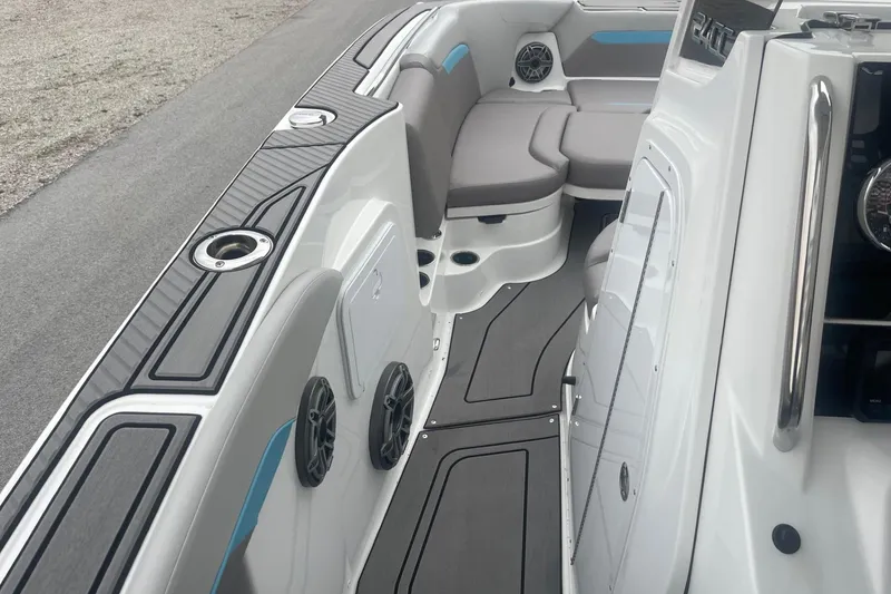 Slide: The Image of 2025 Hurricane Center Console 24 OB boat interior with sleek seating and modern design. - 32