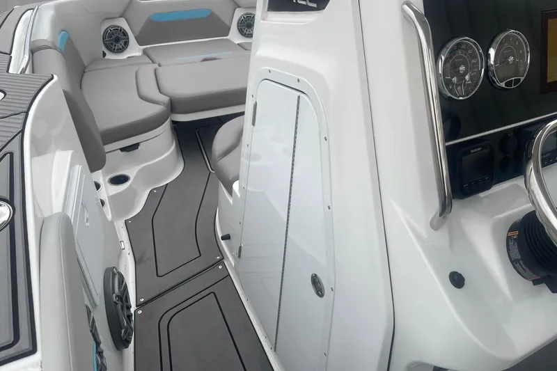Slide: The Image of 2025 Hurricane Center Console 24 OB boat interior with seating and control panel. - 33