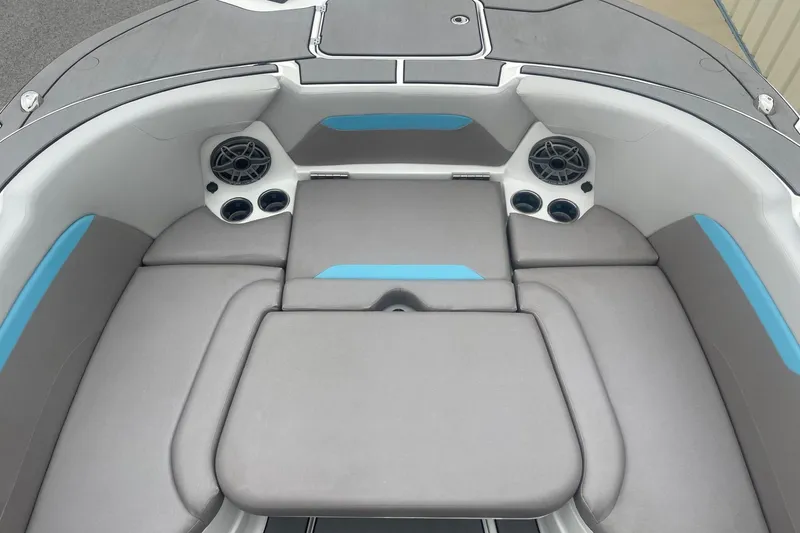 Slide: The Image of 2025 Hurricane Center Console 24 OB boat interior with cushioned seating and built-in speakers. - 39