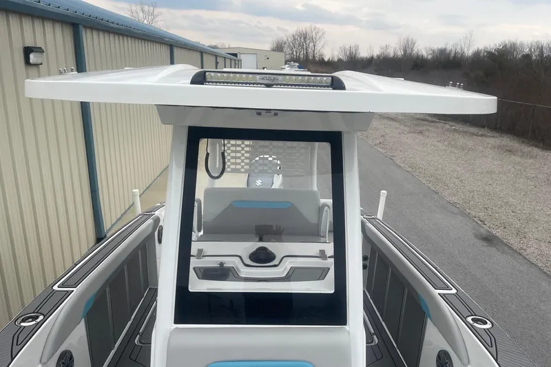 Slide: The Image of 2025 Hurricane Center Console 24 OB boat with sleek design and modern features. - 44