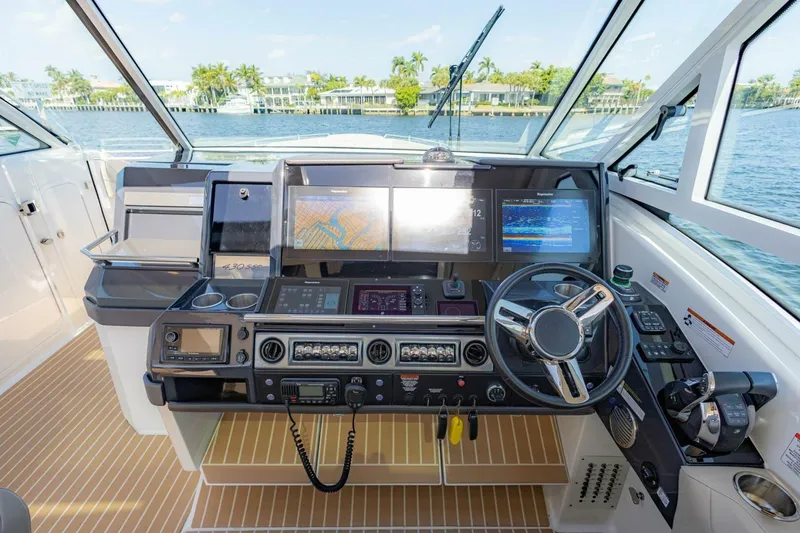 Slide: The Image of Helm of 2018 Formula 430 Super Sport Crossover with advanced navigation displays. - 18