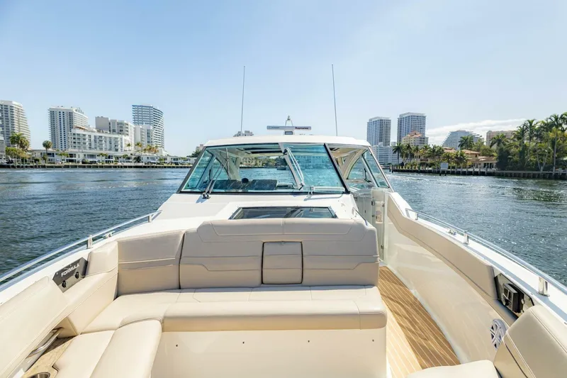 Slide: The Image of 2018 Formula 430 Super Sport Crossover yacht cruising near city skyline. - 36