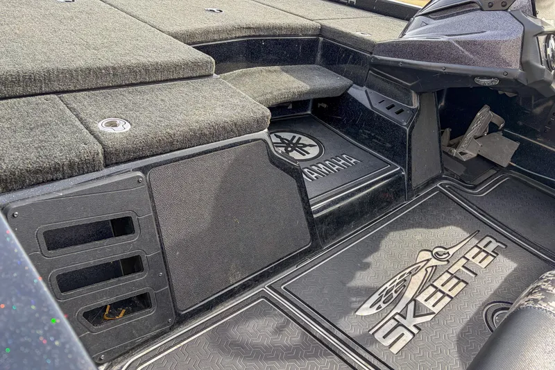 Slide: The Image of 2019 Skeeter ZX200 boat interior with Yamaha branding and carpeted flooring. - 4