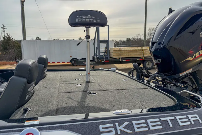 Slide: The Image of 2019 Skeeter ZX200 fishing boat with Yamaha engine, featuring spacious deck and seating. - 8