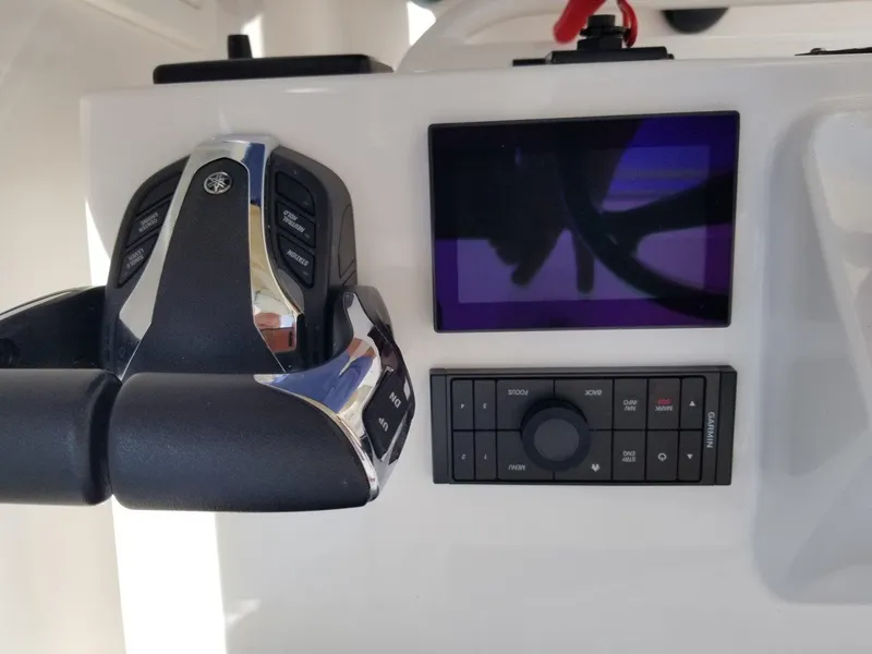 Slide: The Image of Control console of a 2021 Southport 33 DC boat. - 15