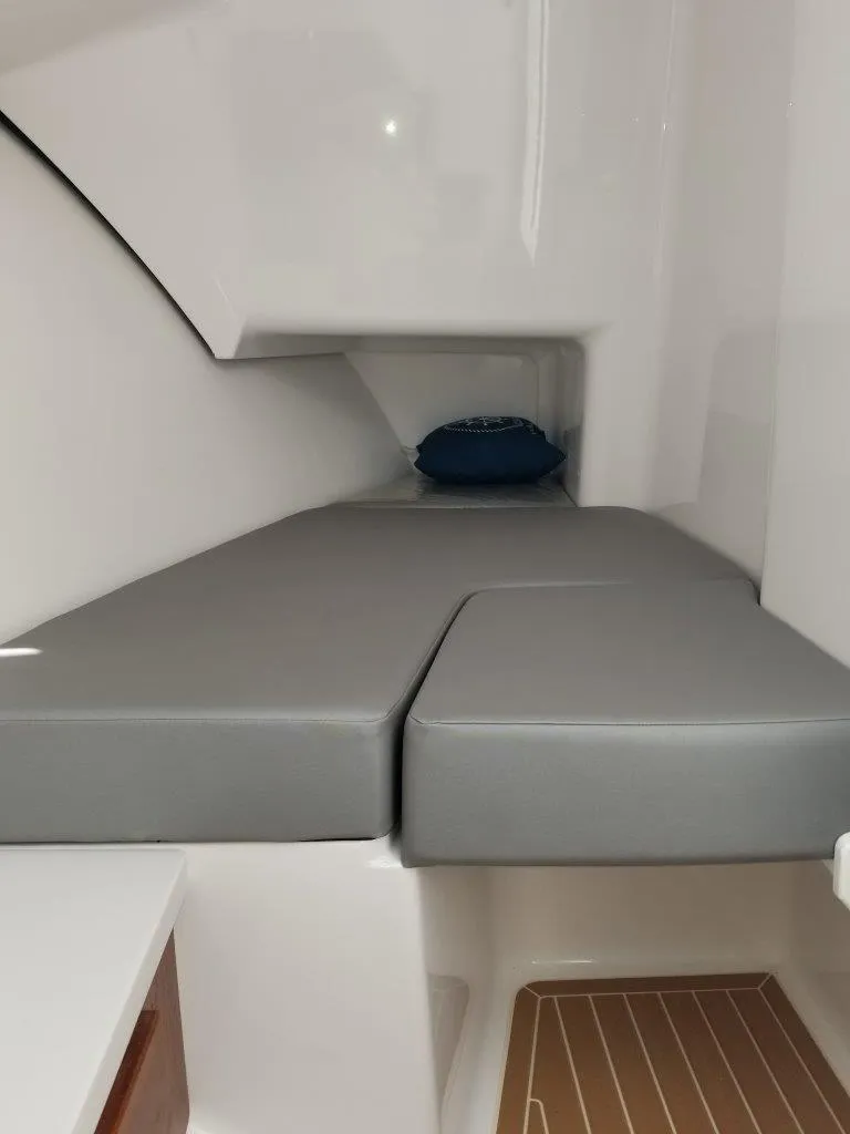 Slide: The Image of Interior of 2021 Southport 33 DC with gray upholstery. - 17