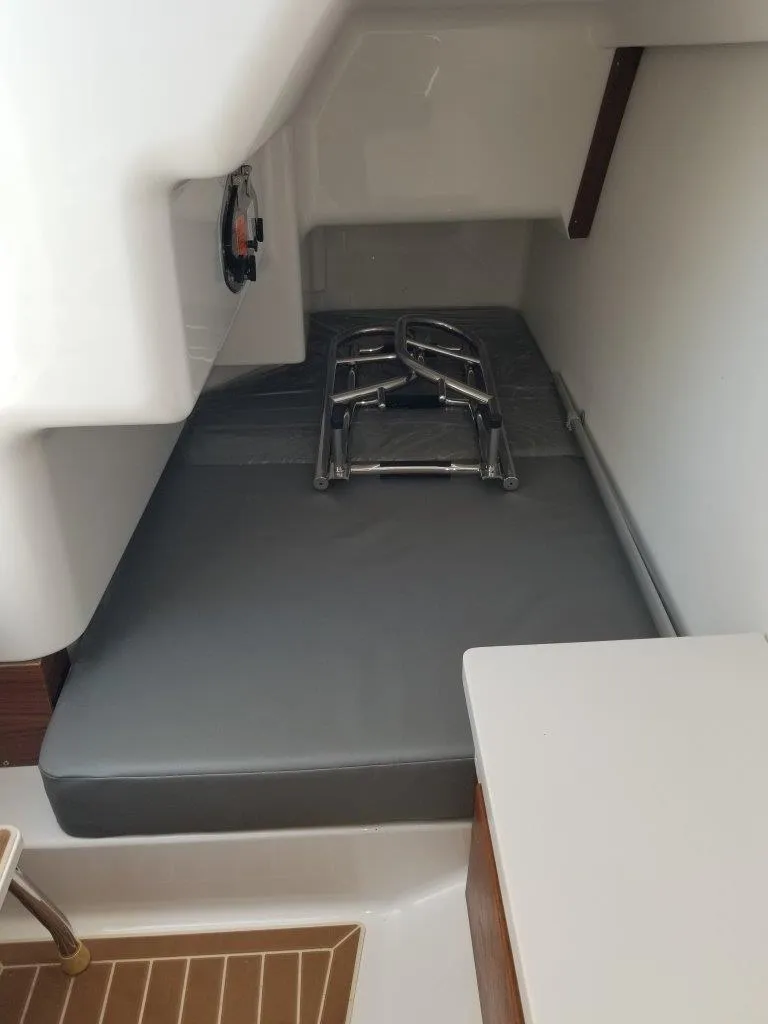 Slide: The Image of Interior of 2021 Southport 33 DC with gray upholstery. - 18