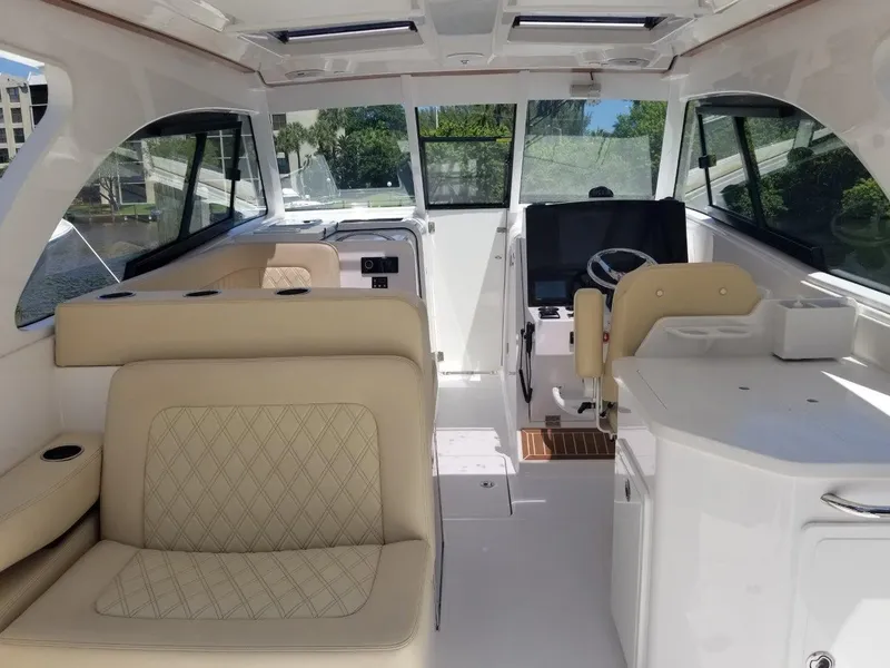 Slide: The Image of Interior of 2021 Southport 33 DC with luxurious seating. - 4