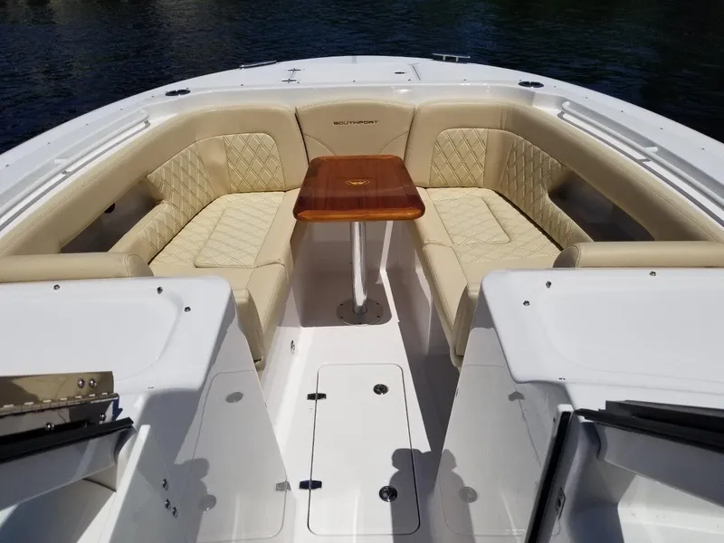 Slide: The Image of Interior of 2021 Southport 33 DC with luxurious seating. - 8