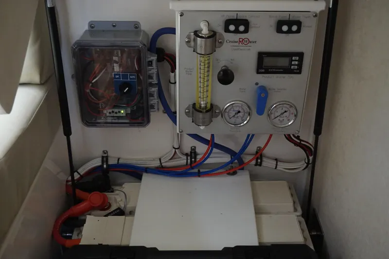Slide: The Image of Control panel and wiring inside a 2005 Cabo 35 Express boat. - 20