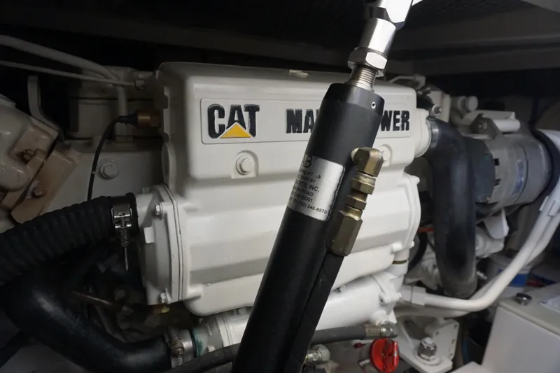 Slide: The Image of Engine room of 2005 Cabo 35 Express with CAT marine power engine. - 27
