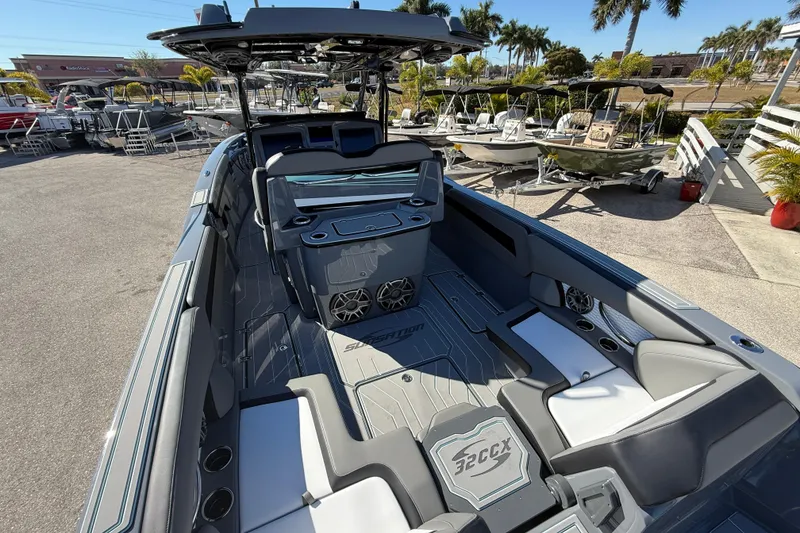 Slide: The Image of 2026 Sunsation 32 CCX boat interior with modern seating and sleek design. - 16