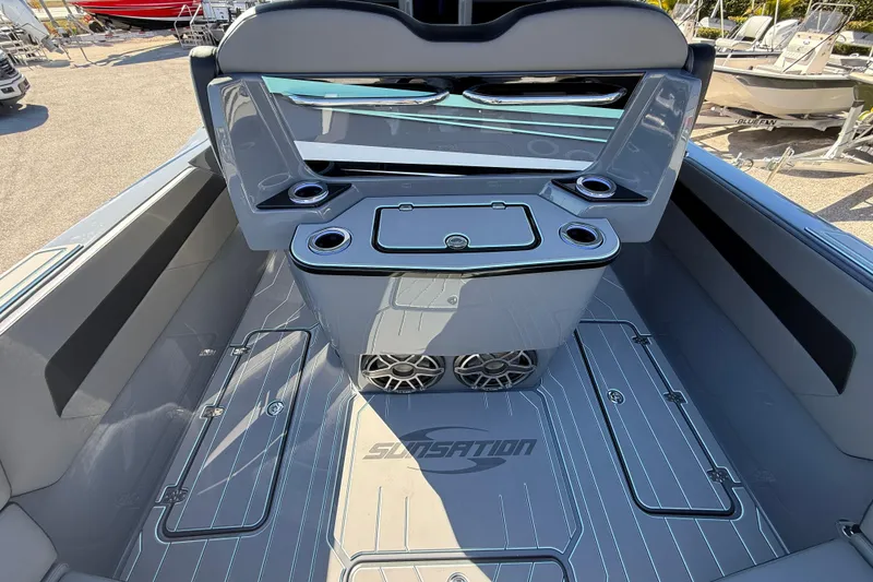 Slide: The Image of 2026 Sunsation 32 CCX boat interior with sleek seating and modern design. - 17