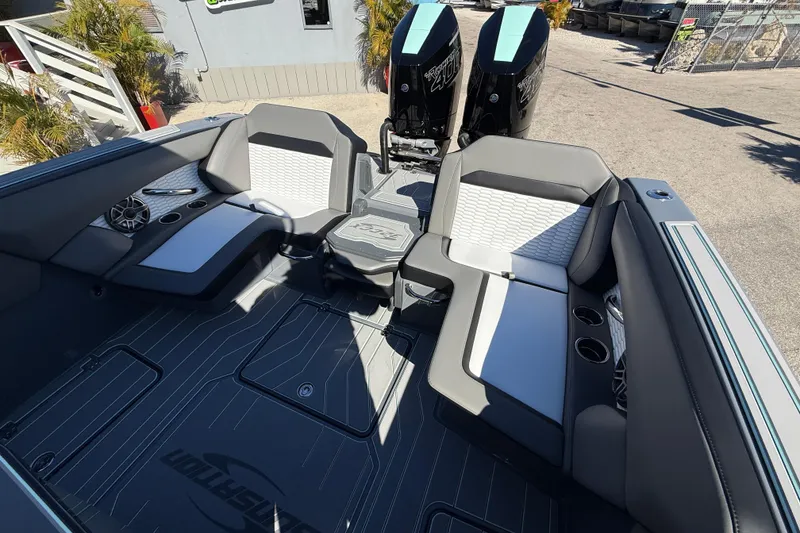 Slide: The Image of 2026 Sunsation 32 CCX boat interior with seating and dual outboard engines. - 21