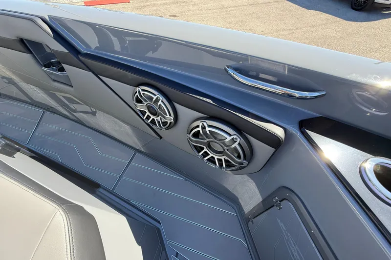 Slide: The Image of 2026 Sunsation 32 CCX boat interior with sleek design and modern speakers. - 31