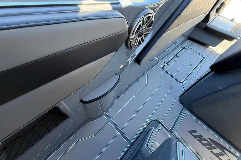 Slide: The Image of Interior of 2026 Sunsation 32 CCX boat, featuring sleek design and modern speaker system. - 32