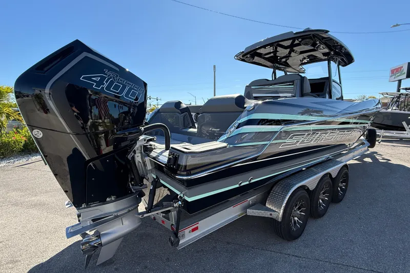 Slide: The Image of 2026 Sunsation 32 CCX boat with powerful Mercury Racing 400 engine on trailer. - 6