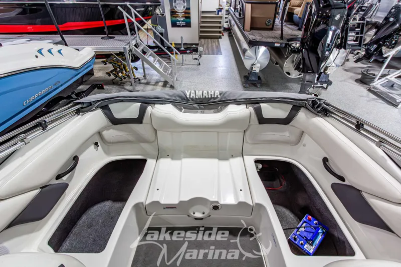Slide: The Image of Interior view of a 2014 Yamaha Boats SX190 at Lakeside Marina showroom. - 12