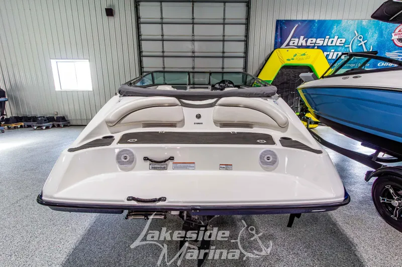 Slide: The Image of 2014 Yamaha Boats SX190 displayed indoors at Lakeside Marina. - 5
