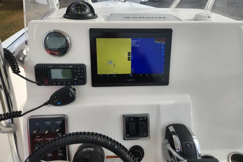 Slide: The Image of Livewell on 2021 Cobia 237 Center Console boat, open with visible interior. - 22