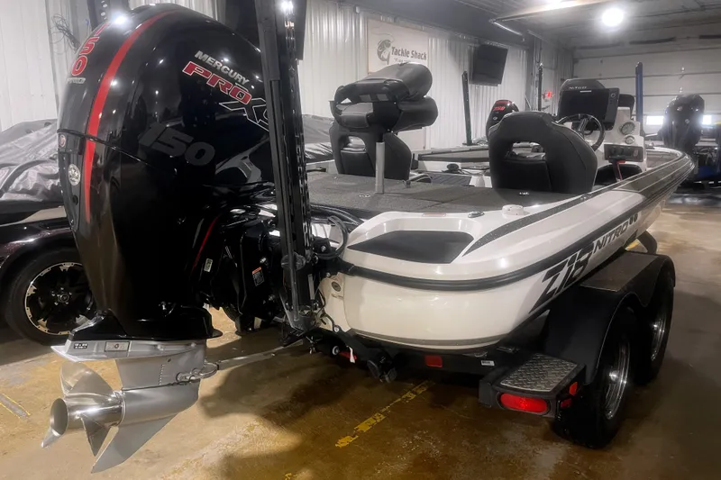 Slide: The Image of 2021 Nitro Z18 boat with Mercury Pro XS 150 engine in showroom. - 4