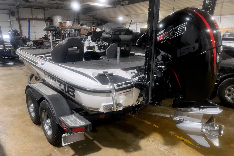 Slide: The Image of 2021 Nitro Z18 boat with Mercury 150 engine in a showroom. - 5