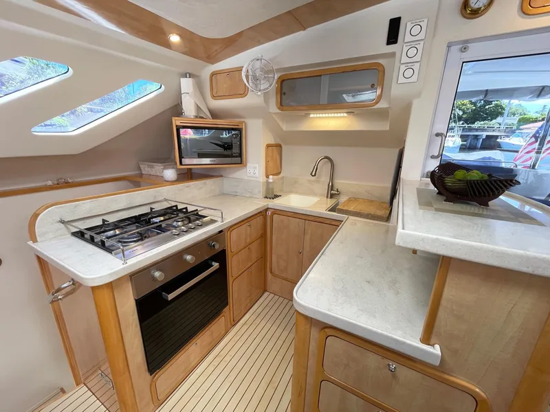 Slide: The Image of Modern kitchen in a 2016 Knysna 500 SE yacht. - 18