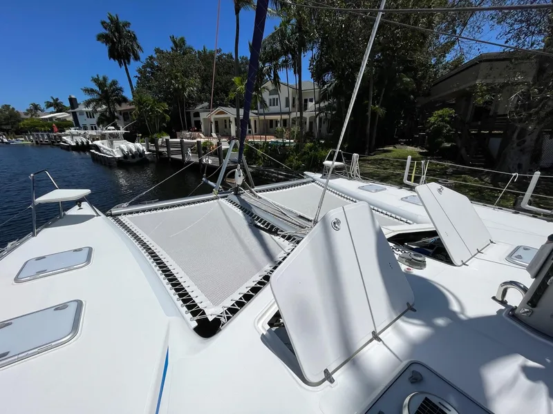 Slide: The Image of Knysna 500 SE 2016 catamaran anchored on calm waters. - 33