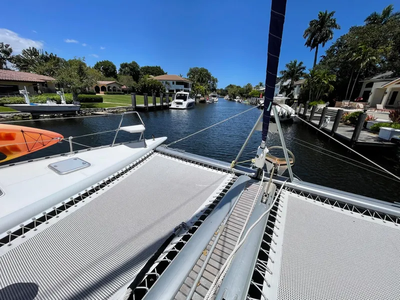 Slide: The Image of Knysna 500 SE catamaran on a tranquil canal, 2016 model. - 36