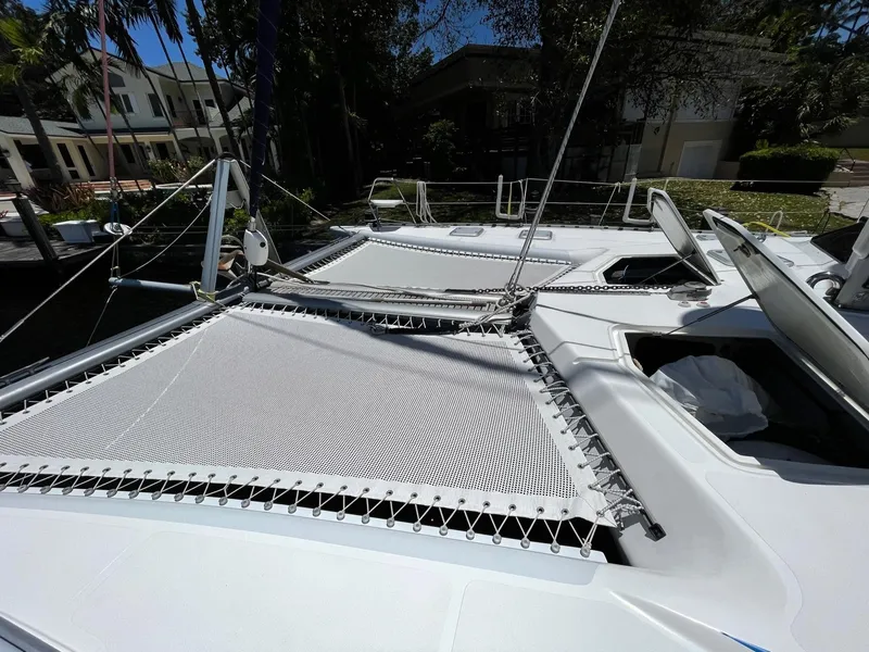 Slide: The Image of 2016 Knysna 500 SE catamaran with net deck in sunny harbor. - 39