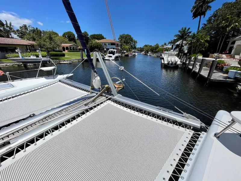 Slide: The Image of Knysna 500 SE catamaran on a serene canal, 2016 model. - 40