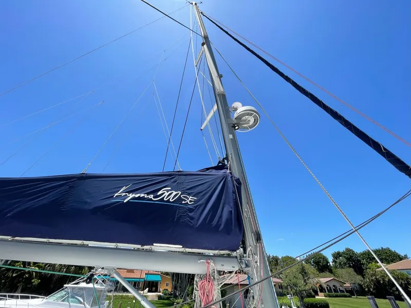 Slide: The Image of Knysna 500 SE sailboat mast under blue sky, 2016 model. - 41