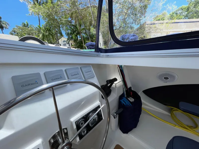 Slide: The Image of Interior of 2016 Knysna 500 SE with steering wheel and Garmin devices. - 48