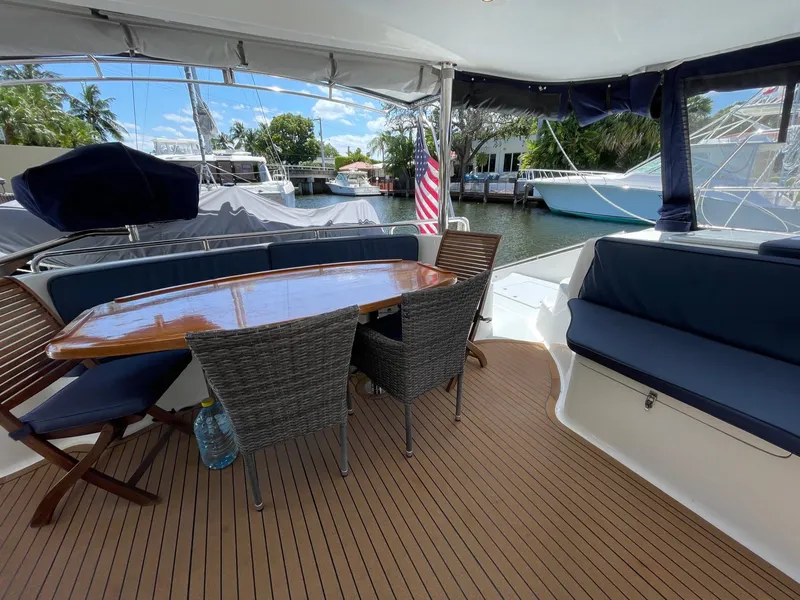 Slide: The Image of Deck area of a 2016 Knysna 500 SE yacht with table and chairs. - 8