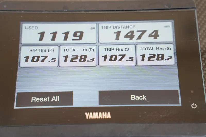 Slide: The Image of Yamaha display showing trip data for 2023 Grady-White Canyon 306 boat. - 33