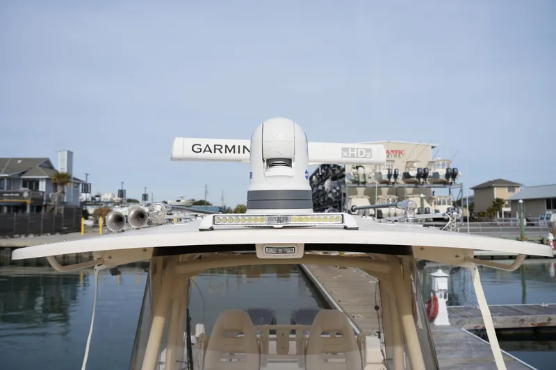Slide: The Image of 2023 Grady-White Canyon 306 boat with Garmin radar at marina dock. - 41