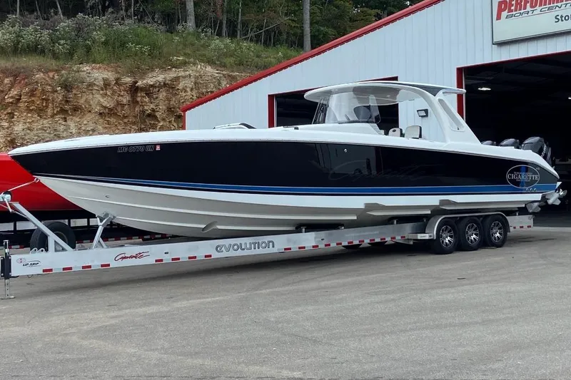 The Image of 2017 Cigarette 41' GTR boat on trailer at dealership, side view. - 0