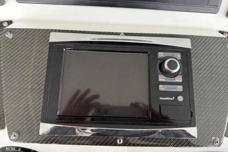 Slide: The Image of Control panel of a 2017 Cigarette 41' GTR boat with VesselView 7 display. - 16