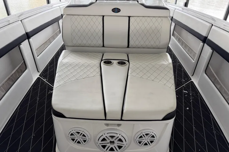 Slide: The Image of Luxurious seating on a 2017 Cigarette 41' GTR boat with diamond-stitched upholstery. - 23