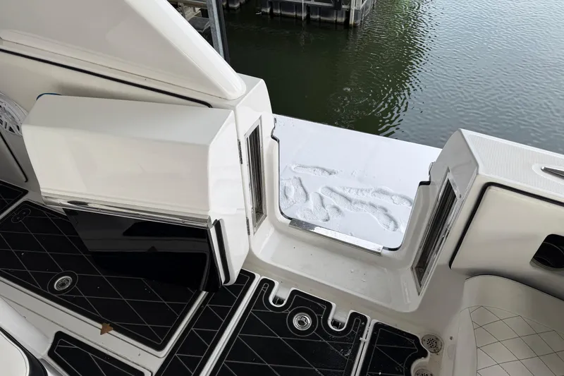 Slide: The Image of 2017 Cigarette 41' GTR with Mercury Verado engines docked by the water. - 41