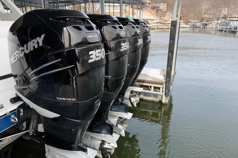 Slide: The Image of Four Mercury Verado 350 engines on a 2017 Cigarette 41' GTR boat at a dock. - 43