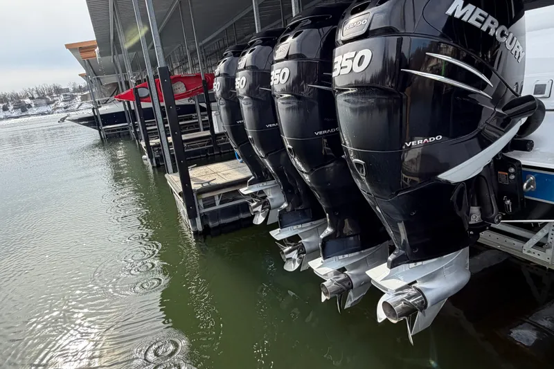 Slide: The Image of Four Mercury Verado 350 engines on a 2017 Cigarette 41' GTR boat at a dock. - 44
