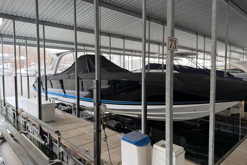 Slide: The Image of 2017 Cigarette 41' GTR boat docked under a covered marina slip. - 8