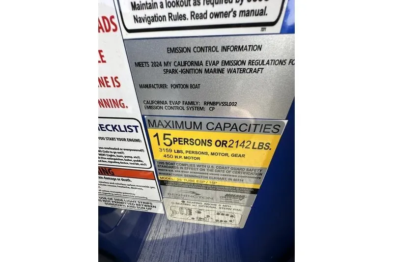 Slide: The Image of 2025 Bennington M Swingback 26 MSB capacity label: 15 persons or 2142 lbs, 450 HP motor. - 14