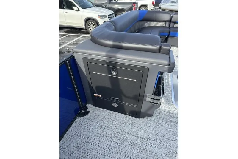 Slide: The Image of 2025 Bennington M Swingback 26 MSB boat interior with sleek seating and storage. - 19