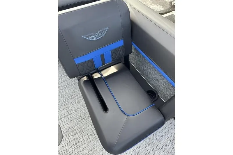 Slide: The Image of 2025 Bennington M Swingback 26 MSB boat seat with blue accents and logo detailing. - 20