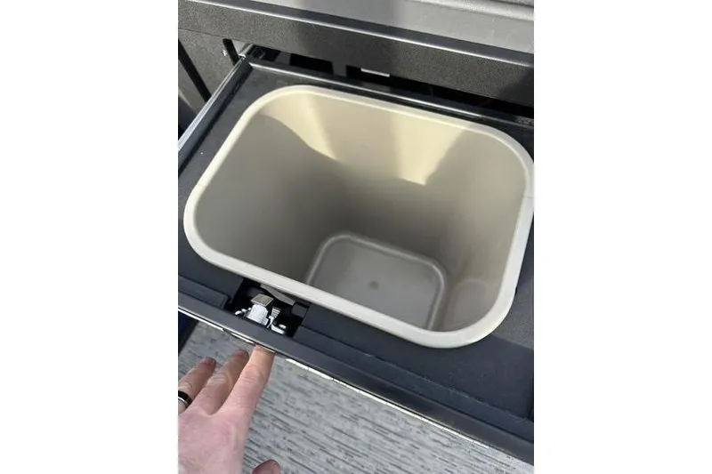 Slide: The Image of Built-in storage compartment on 2025 Bennington M Swingback 26 MSB boat. - 21