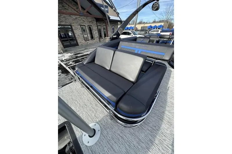 Slide: The Image of 2025 Bennington M Swingback 26 MSB boat with sleek seating and modern design. - 24