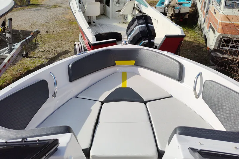 The Image of 2017 Four Winns 200 Horizon LE boat interior with cushioned seating. - 1