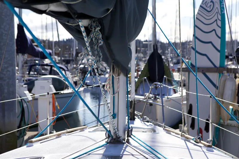 Slide: The Image of Sailboat deck view of 1992 Hunter 33.5 model in marina setting. - 8